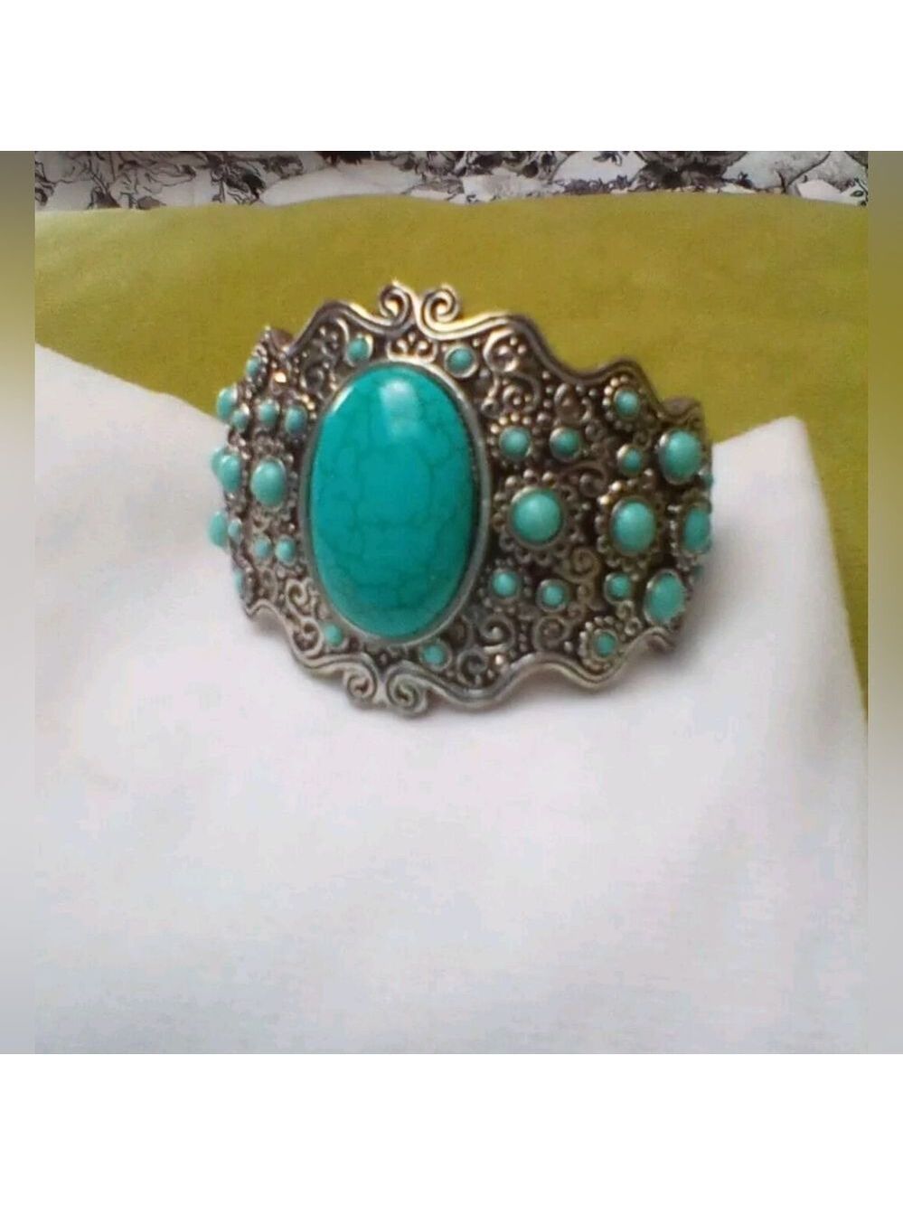 Ladies native style cuff bracelet with Turquoise stones. Perfect condition.